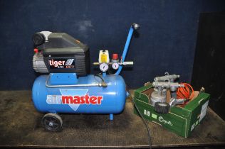 AN AIRMASTER TIGER 8/25 TURBO COMPRESSOR along with a tyre inflator and two spray guns (PAT fail due