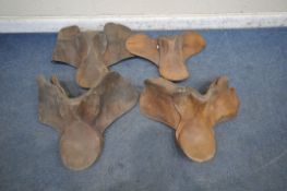 FOUR VARIOUS TANNED LEATHER SADDLES (condition report: marks, scuffs, wear and tear, other signs