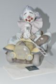 A LLADRO PRIVILEGE 'TRIP TO THE CIRCUS' FIGURE, model no 8136, sculptor Francisco Polope, issued