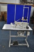 A BROTHER EXEDRA E40 INDUSTRIAL SEWING MACHINE on work table width 105cm depth 59cm total height