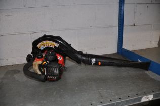 A HOMELITE HLB26BV PETROL LEAF BLOWER (engine starts and runs)