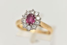 AN 18CT GOLD RUBY AND DIAMOND CLUSTER RING, oval cluster centering on an oval cut ruby, in a ten