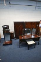 A STAG MINSTREL SEVEN PIECE BEDROOM SUITE, comprising a triple door wardrobe, width 157cm x depth