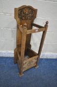 AN ARTS AND CRAFTS STYLE OAK STICK / UMBRELLA STAND, with foliate decoration, width 41cm x depth