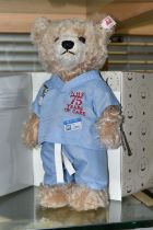 A BOXED STEIFF LIMITED EDITION NHS '75 YEARS OF CARE' TEDDY BEAR, exclusive to Danbury Mint, no.