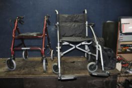 AN ENIGMA FOLDING WHEELCHAIR with footrests and carry bag along with an Aidapt travelator (2)