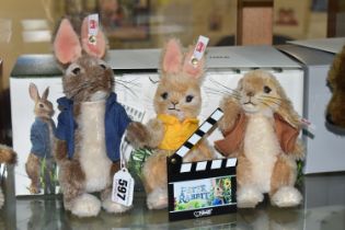 A BOXED STEIFF LIMITED EDITION PETER RABBIT GIFT SET OF THREE CHARACTERS AND CLAPPER BOARD, (Peter