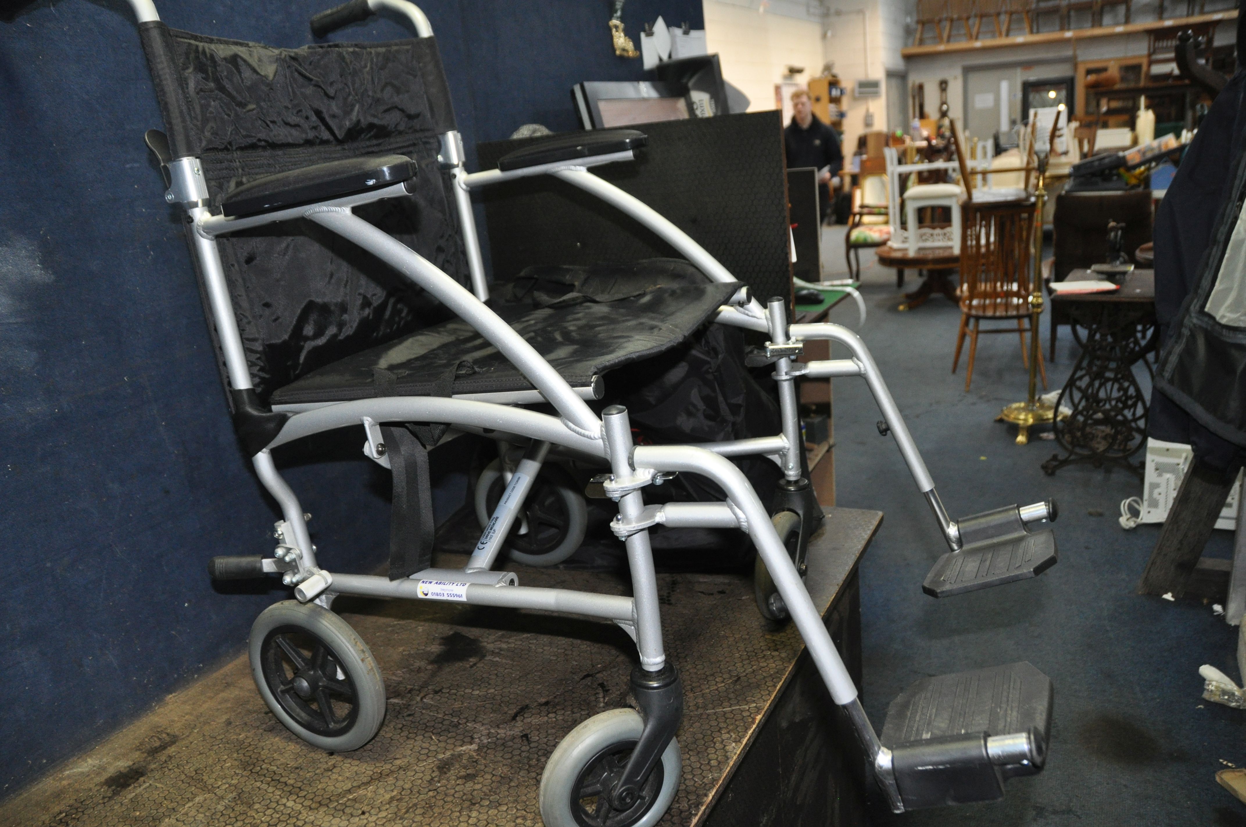 AN ENIGMA FOLDING WHEELCHAIR with footrests and carry bag along with an Aidapt travelator (2) - Image 3 of 4