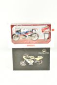 TWO BOXED 1:12 SCALE MODEL MOTORBIKES, to include a Universal Hobbies 'Joey Dunlop' Honda RC30, Isle