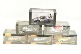 SIX BOXED 1:43 SCALE DIECAST MODEL RACE CARS, to include an IXO MG Metro 6R4, model no. RAC116, an