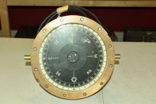 A SYNCHRONOUS BEARING REPEATER GYRO COMPASS, numbered 6605-99-527-0727, serial number R96.14.MR01.