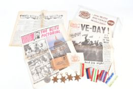 A BOX SET OF WWII MEDALS AND TWO NEWSPAPERS, the medal come with their entitlement slip and was