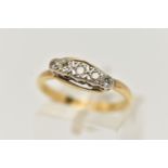 A YELLOW METAL DIAMOND FIVE STONE RING, set with graduating single cut diamonds, to the plain