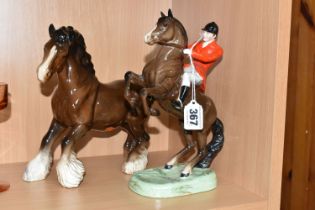 TWO BESWICK FIGURES, comprising 'Rearing Huntsman' 868 and 'Prancing Shire Horse' model No.975,