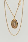 AN 18CT GOLD PORTRAIT PENDANT AND CHAIN, an oval miniature portrait pendant, depicting a lady in
