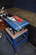 A CLARKE CTS800B TABLE SAW ON STAND bed width 34cm length 50cm overall height 95cm (PAT pass and