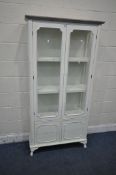 A WHITE PAINTED DISPLAY CABINET, with double glazed door, above four drawer, width 89cm x depth 35cm
