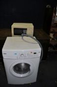A ZANUSSI LINDO 100 WASHING MACHINE width 60cm depth 56cm height 85cm (spin cycle run but not tested