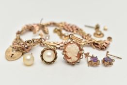 AN ASSORTED BAG OF YELLOW METAL JEWELLERY, to include a yellow metal bracelet, fitted with a heart