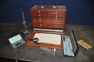 A NESLEIN ENGINEERS TOOLCHEST with a mahogany cabinet, lift off front concealing eight internal