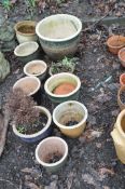 A SELECTION OF GLAZED GARDEN POTS including a 46cm diameter pot ( cracked and various sizes of blue,