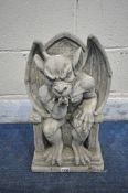 A MODERN COMPOSITE GROTESQUE FIGURE, seated on a throne, width 30cm x depth 20cm x height 48cm (