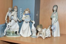 A GROUP LLADRO AND NAO FIGURES, comprising a boxed Lladro 8353 'Oh Happy Days' figure designed by