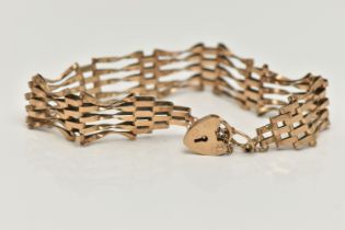 A 9CT GOLD GATE BRACELET, a five row gate bracelet, fitted with a small heart padlock clasp,