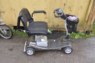 AN ELECTRIC MOBILITY SCOOTER with battery, charger and two keys (PAT pass and working)