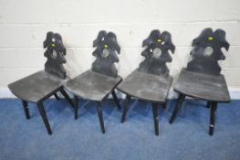 A SET OF FOUR PINE HALL CHAIRS, with shaped backrest, raised on four octagonal tapered legs (
