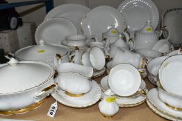 A QUANTITY OF ROYAL ALBERT 'VAL D'OR' PATTERN DINNERWARE, comprising two covered tureens, oval