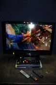 A TOSHIBA REGZA 32AV633D 32in TV with remote, a Goodman's Freeview box with remote, a Logik DVD