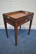A 20TH CENTURY WALNUT SIDE TABLE, with twin handles and open fretwork gallery top, on square tapered
