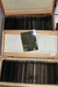 TWO BOXES OF GLASS PHOTOGRAPHIC NEGATIVE SLIDES (approx. 10.7cm x 8.2cm) containing 90 slides