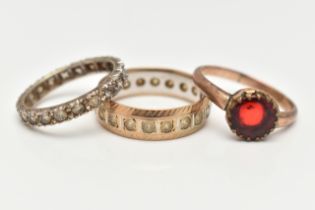 THREE ASSORTED RINGS, to include a 9ct gold and spinel full set eternity band ring, approximate