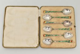 A CASED SET OF SIX ENAMEL SILVER TEASPOONS, each decorated with a green enamel floral stem and