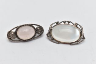 TWO BROOCHES, the first of an oval form, set with an oval cut moonstone cabochon, open work