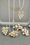 THREE PIECES OF WHITE METAL IMITATION PEARL JEWELLERY, to include a pair of white metal, bunch of