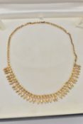 A 9CT GOLD FRINGE NECKLACE, triangular fringe, fitted to the oval link chain, with spring clasp,