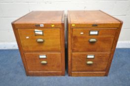 A PAIR OF 20TH CENTURY OAK TWO DRAWER FILING CABINETS, with brass plaque reading 'Fishers School