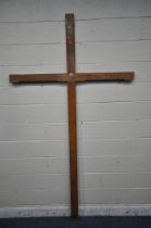 A LARGE OAK RELIGIOUS CROSS, width 142cm x height 248cm (condition report: collected from Chase