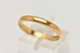 A 22CT YELLOW GOLD WEDDING RING, designed as a plain polished court shape cross section band,