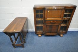 A 20TH CENTURY OAK SIDE BY SIDE BUREAU BOOKCASE, the fall front door enclosing a fitted interior,