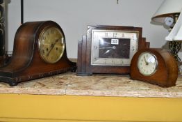 A GROUP OF THREE ART DECO WOODEN CASED MANTEL CLOCKS, comprising a square stepped clock mechanism