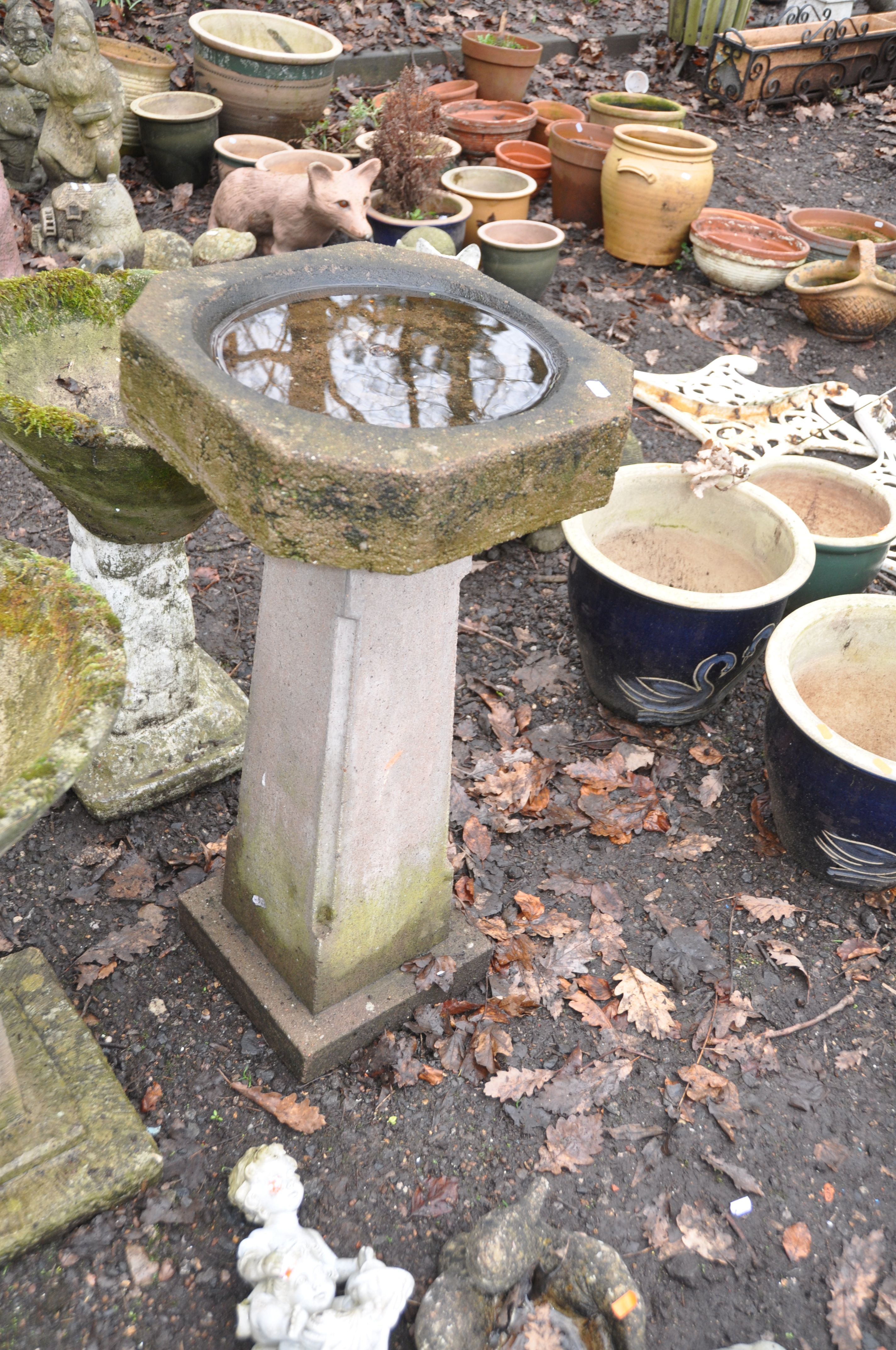 A MODERN COMPOSITE BIRD BATH 83cm high, a modern composite staddle stone 55cm high, two pedestals - Image 2 of 4