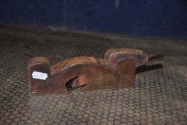 A VINTAGE STEEL FOOTED REBATE PLANE with wooden body stamped A.Buxton 10in in length (Condition