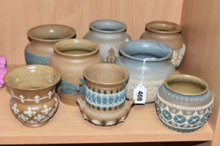 A GROUP OF DOULTON LAMBETH SILICON WARE POTS, eight pieces with applied floral, foliate and