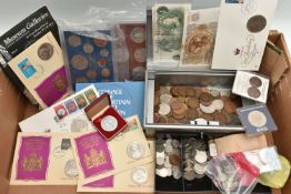 A LARGE CARDBOARD BOX OF COINS AND COMMEMORATIVES AND A SMALL AMOUNT OF SILVER CONTENT COINS, The