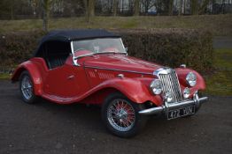 A 1954 MG TF VINTAGE SPORTS ROADSTER, THAT'S FULLY RESTORED in red, first registered January 2013