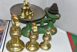 A SET OF CAST BALANCE SCALES AND BRASS WEIGHTS, comprising a green painted set of cast scales with a